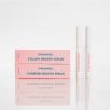 frownies Eyelash Growth Serum & Eyebrow Growth Serum shown pictured together, while also showing the pink packaging it comes in