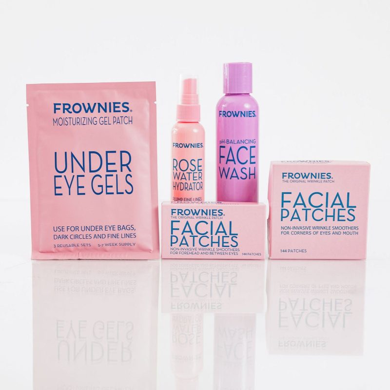 A group of Frownies products under eye gels facial patches FBE & CEM, face wash, and rose water hydrator spray